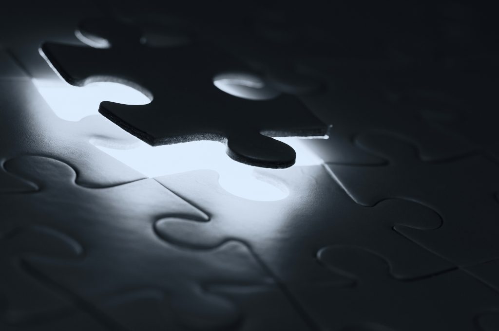 Connecting puzzle pieces, representing the sources brought together in strategic analysis